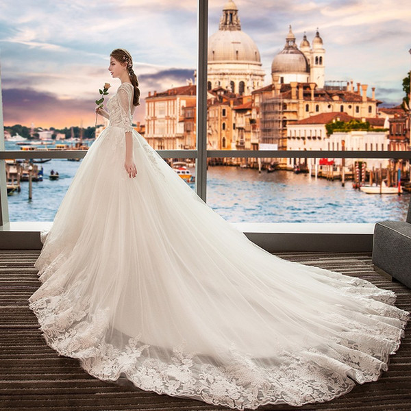 Wedding dress new bride wedding European and American Princess Palace dream long tail long sleeve shoulder summer