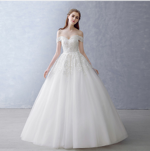 New High-Quality Rice White Shoulder Drag Wedding Dresses Strapless Lace Autumn And Winter Lace Decals Beaded Pompon Church Dresses