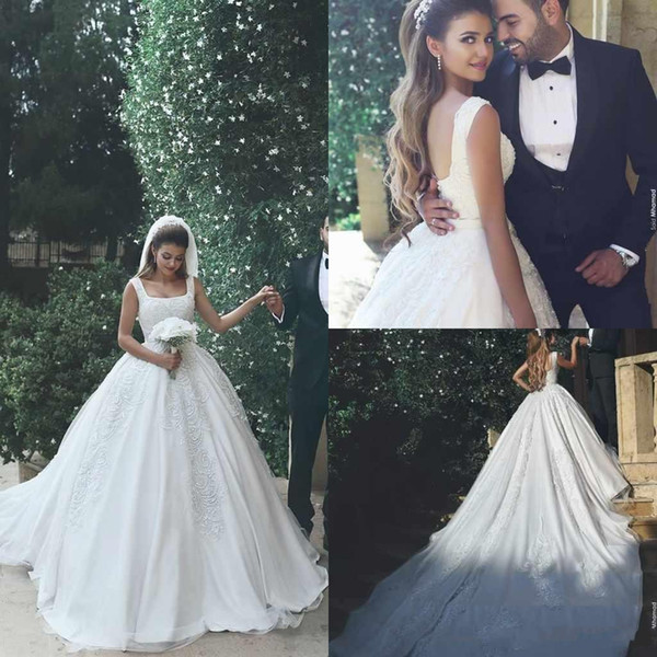 Arabic Ball Gown Wedding Dresses Spaghetti Backless Appliques Beads Cathedral Train Chapel Castle Bridal Gowns Customized Ivory Cheap