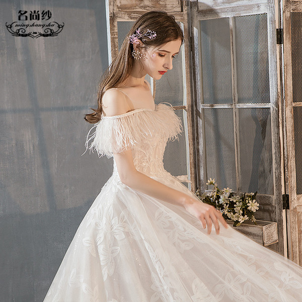 Light wedding dress 2019 new tug-tailed French Hebensen superfairy feather one-shoulder wedding bride female small bride