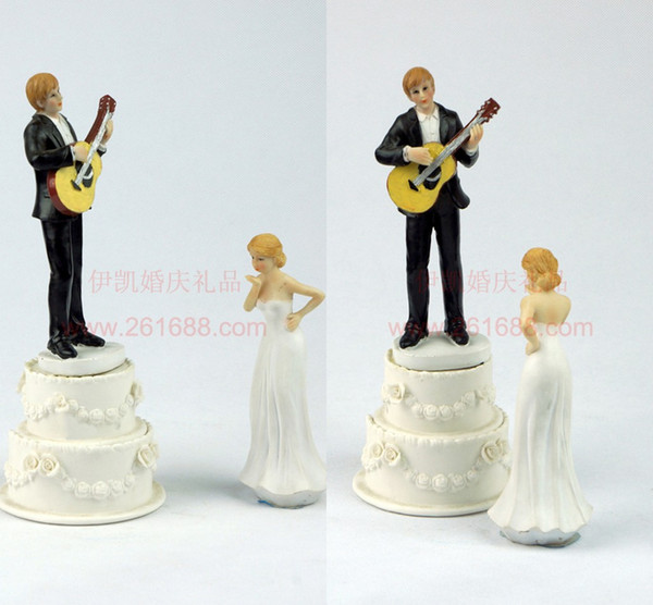 Wedding Cake Topper Wedding SupplyThis bride and groom couple is sharing Wedding Cake Topper Wedding Events Decorations Wedding Dolls