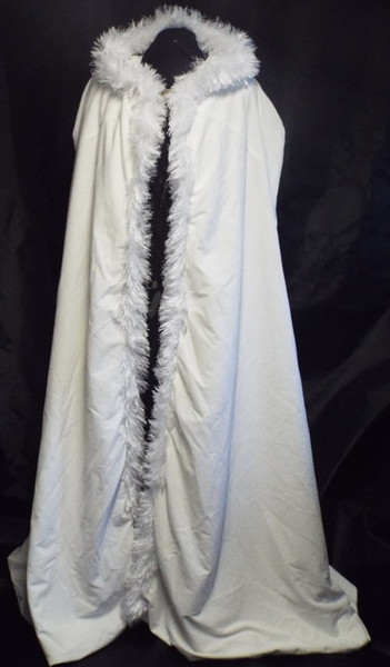 The lady's large white cape has a button for the bride's wedding and tail hair